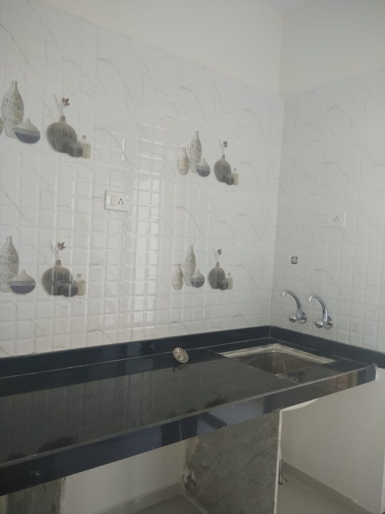 Kitchen, raj-tulsi-aastha 1 Bedroom 615 Sq.Ft. Apartment In Badlapur East Thane 9200521