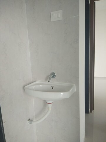 Bathroom in 1 BHK Apartment at Raj Tulsi Aastha, Badlapur East – for Sale