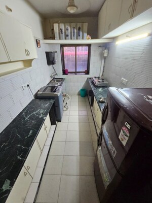 Kitchen in  Pg at Ambika Darshan, Kandivali East – for Rent