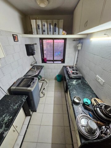 Kitchen in  Pg at Ambika Darshan, Kandivali East – for Rent
