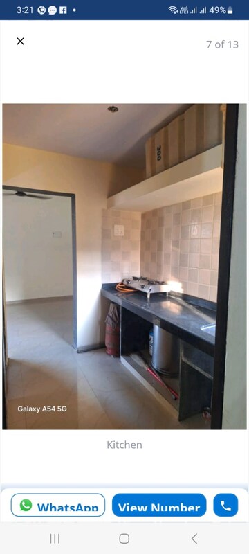 Kitchen in 2 BHK Apartment at Shree Tirupati STG Signature Residency, Patlipada – for Rent