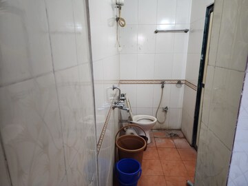 Bathroom in 2 BHK Apartment at Kopar Khairane – for Rent