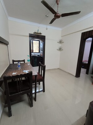 Living Room in 1 BHK Apartment at Kopar Khairane – for Rent