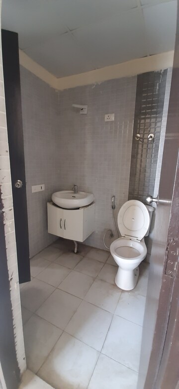Bathroom in 3 BHK Apartment at Land Craft Golf Links Apartment Phase 2, Pandav Nagar – for Rent