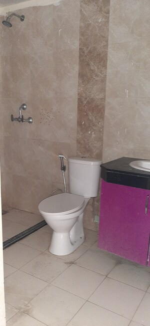 Bathroom in 3 BHK Apartment at Land Craft Golf Links Apartment Phase 2, Pandav Nagar – for Rent
