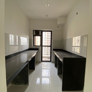Kitchen in 2 BHK Apartment at Runwal Gardens, Bhadra Nagar – for Rent