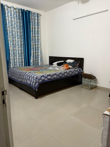 Bedroom in 3 BHK Apartment at Sushma Elite Cross, Dhakoli – for Rent