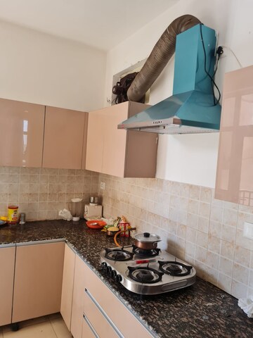 Kitchen in 3 BHK Apartment at Sushma Elite Cross, Dhakoli – for Rent