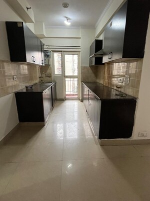 Kitchen in 2 BHK Apartment at Gardenia Golf City, Sector 75 – for Sale