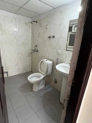 Bathroom in 2 BHK Apartment at Gardenia Golf City, Sector 75 – for Sale