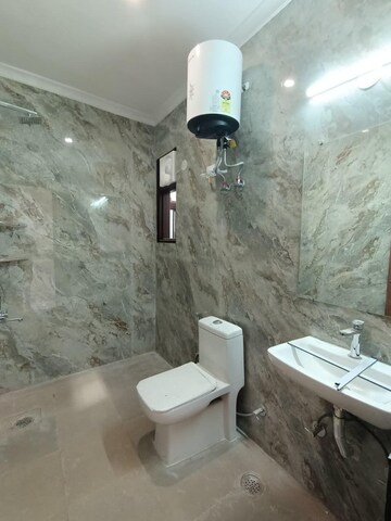 Bathroom in 1 BHK Builder Floor at Freedom Fighters Enclave – for Rent