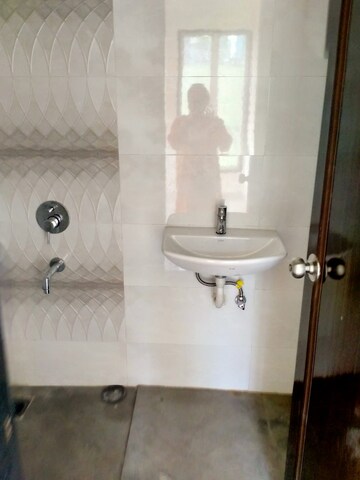 Bathroom in 2 BHK Apartment at Karmvir Avant Sky Villa, Goregaon East – for Rent