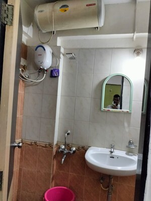 Bathroom in 1 BHK Apartment at Mantri Park, Goregaon East – for Rent