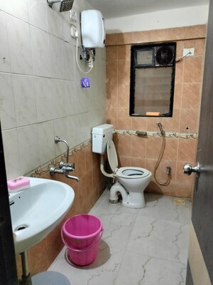 Bathroom in 1 BHK Apartment at Mantri Park, Goregaon East – for Rent