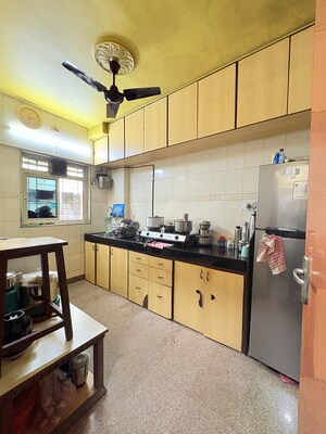 Kitchen in 1 BHK Apartment at Bindra Complex, Andheri East – for Sale