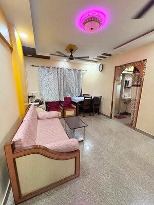 Living Room in 1 BHK Apartment at Bindra Complex, Andheri East – for Sale