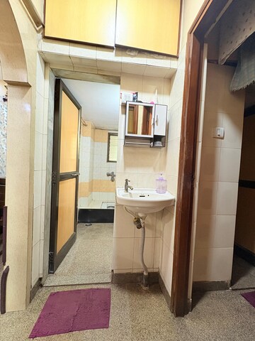 Kitchen in 1 BHK Apartment at Bindra Complex, Andheri East – for Sale