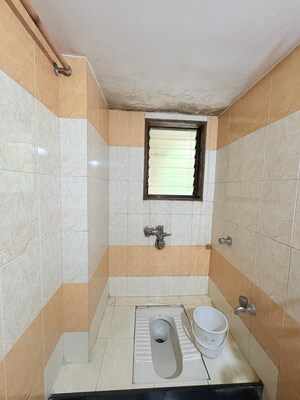 Bathroom in 1 BHK Apartment at Bindra Complex, Andheri East – for Sale