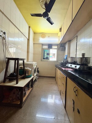 Kitchen in 1 BHK Apartment at Bindra Complex, Andheri East – for Sale