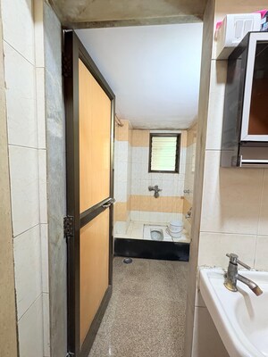 Kitchen in 1 BHK Apartment at Bindra Complex, Andheri East – for Sale