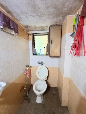 Bathroom in 1 BHK Apartment at Bindra Complex, Andheri East – for Sale