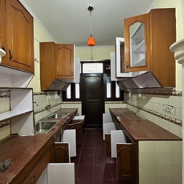 Kitchen in 6+ BHK Independent House at Ansal Plaza Sector-23, Carterpuri Village – for Sale