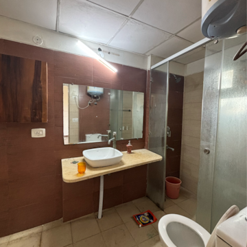 Bathroom in 2.5 BHK Apartment at Mahagun Mirabella, Sector 79 – for Rent