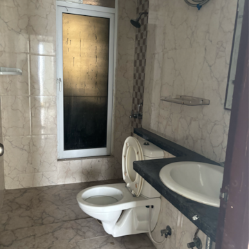 Bathroom in 2.5 BHK Apartment at Mahagun Mirabella, Sector 79 – for Rent