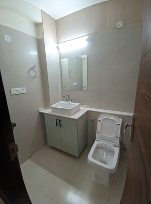Bathroom in 3 BHK Apartment at Eros Mayfair Towers, Charmwood Village – for Rent