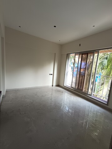 Room in 2 BHK Apartment at AMO Swapna Sudha CHSL, Andheri East – for Sale
