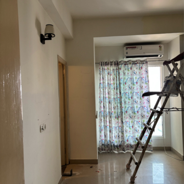 Staircase in 3.5 BHK Apartment at Mahagun Moderne, Sector 78 – for Rent
