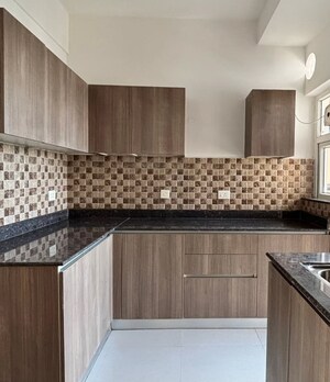 Kitchen in 3 BHK Apartment at Adani M2K Oyster Grande, Sector 102 – for Rent