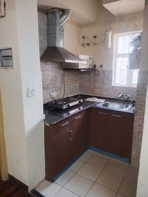 Kitchen in 1 BHK Apartment at Paras Tierea, Sector 137 – for Rent