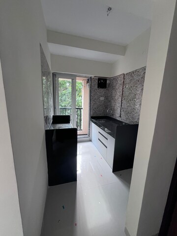 Kitchen in 1 BHK Apartment at Raunak Residency Thane, Pokhran Road No One – for Rent