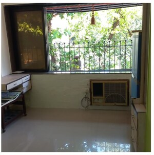 Living Room in 1.5 BHK Apartment at Shree Shastri Krupa CHS, Andheri West – for Rent