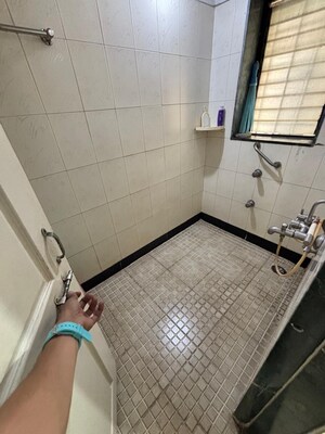 Bathroom in 2 BHK Apartment at Soham Garden, Manpada – for Rent