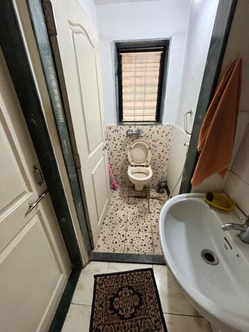 Attached Bathroom in 2 BHK Apartment at Soham Garden, Manpada – for Rent