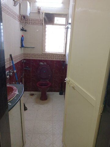 Bathroom in 2 BHK Apartment at Sterling CHS, Andheri West – for Rent