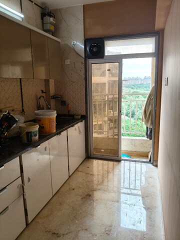Kitchen in 2 BHK Apartment at Om Prabhu Manohar CHS, Seawoods Sector 50 – for Rent