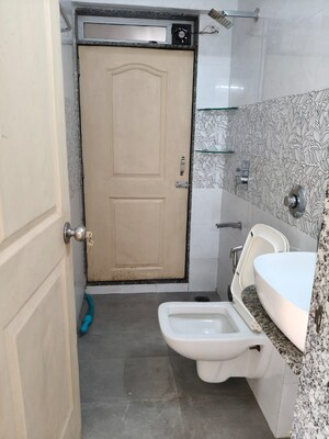 Bathroom in 2 BHK Apartment at Om Prabhu Manohar CHS, Seawoods Sector 50 – for Rent
