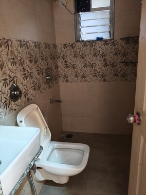 Bathroom in 2 BHK Apartment at Om Prabhu Manohar CHS, Seawoods Sector 50 – for Rent