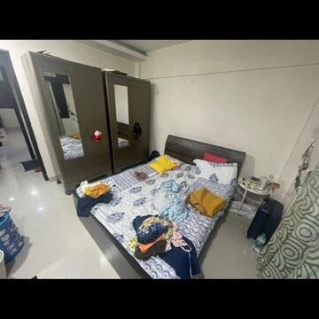 Bedroom in 2 BHK Apartment at Lokhandwala Breeze Apartments, Lokhandwala Complex – for Rent