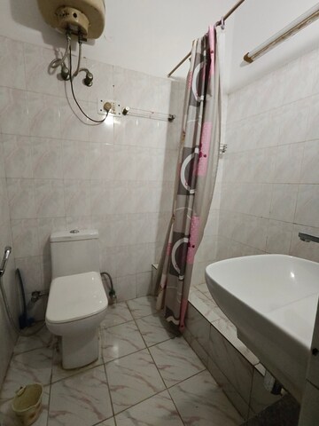 Bathroom in 3 BHK Builder Floor at Ansal Sushant Apartments, Sushant Lok I – for Rent
