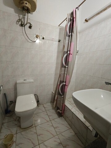 Bathroom in 3 BHK Builder Floor at Ansal Sushant Apartments, Sushant Lok I – for Rent