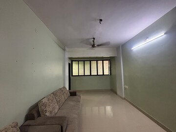 Living Room in 1.5 BHK Apartment at Seawoods – for Rent