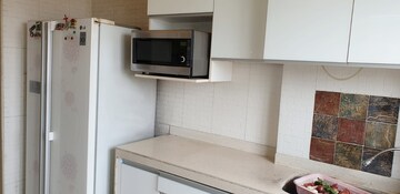 Kitchen in 2 BHK Apartment at Hiranandani Gardens Lake Castle, Powai – for Rent