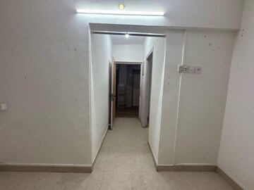 Building Lobby in 2 BHK Apartment at Silver Arch Eden woods, Andheri West – for Rent