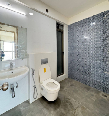 Bathroom in 2 BHK Apartment at Raj Infinia, Evershine Nagar – for Rent