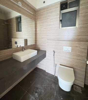 Bathroom in 2 BHK Apartment at Raj Infinia, Evershine Nagar – for Rent