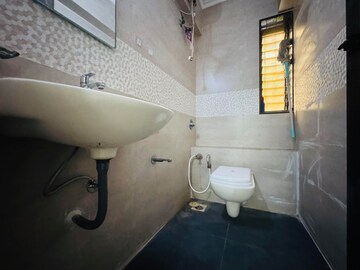 Bathroom in 2 BHK Apartment at Sumeru CHS, Andheri West – for Rent